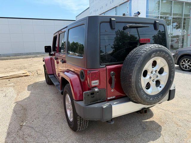 used 2013 Jeep Wrangler Unlimited car, priced at $12,749