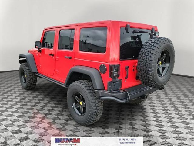 used 2013 Jeep Wrangler Unlimited car, priced at $26,995