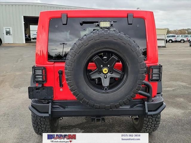 used 2013 Jeep Wrangler Unlimited car, priced at $26,995