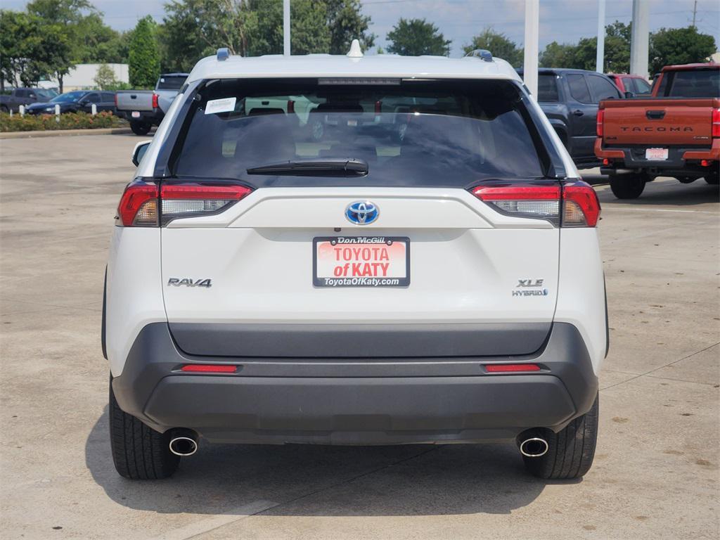 used 2024 Toyota RAV4 Hybrid car, priced at $31,295