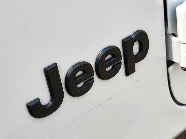 used 2023 Jeep Wrangler car, priced at $29,295