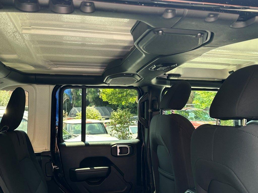 used 2023 Jeep Wrangler 4xe car, priced at $28,250
