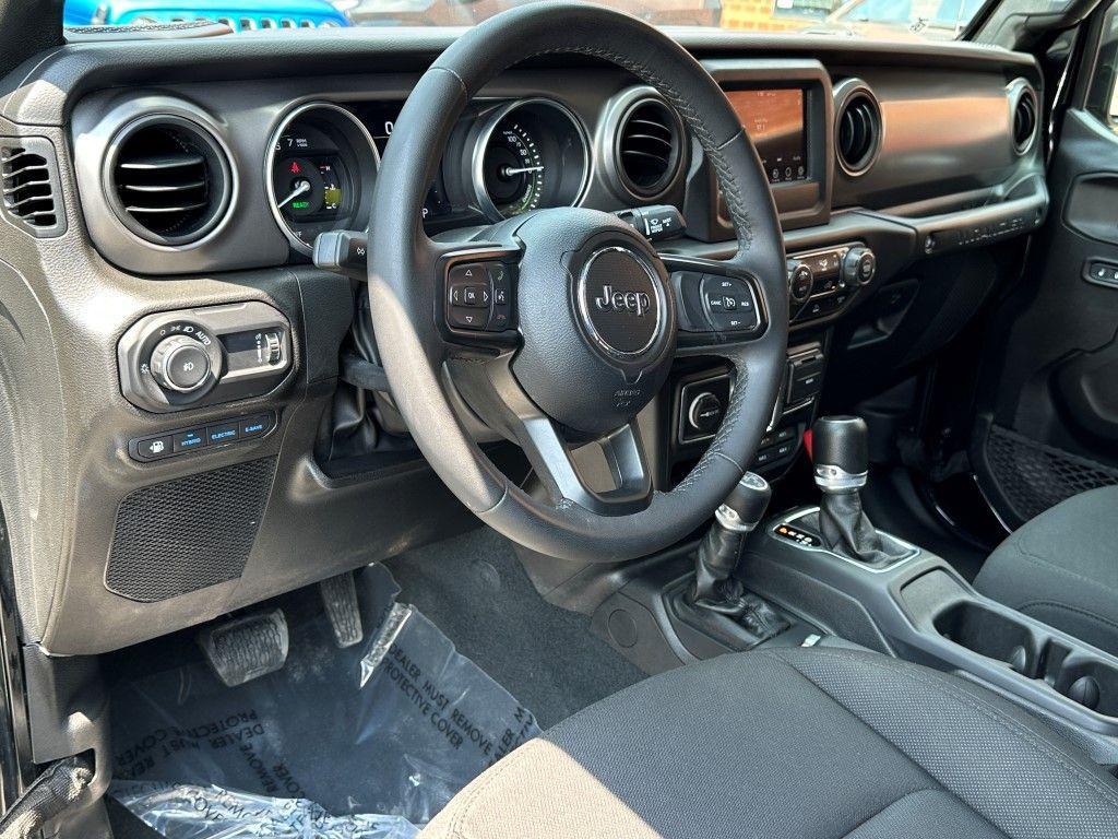 used 2023 Jeep Wrangler 4xe car, priced at $28,250