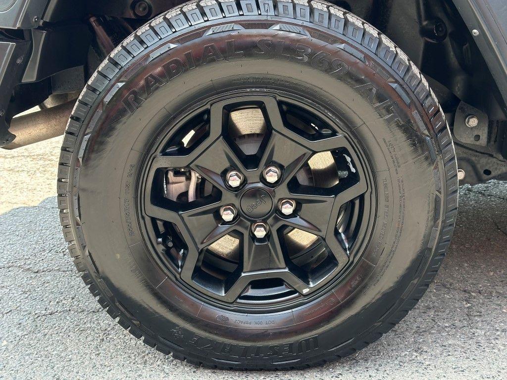 used 2023 Jeep Wrangler 4xe car, priced at $28,250