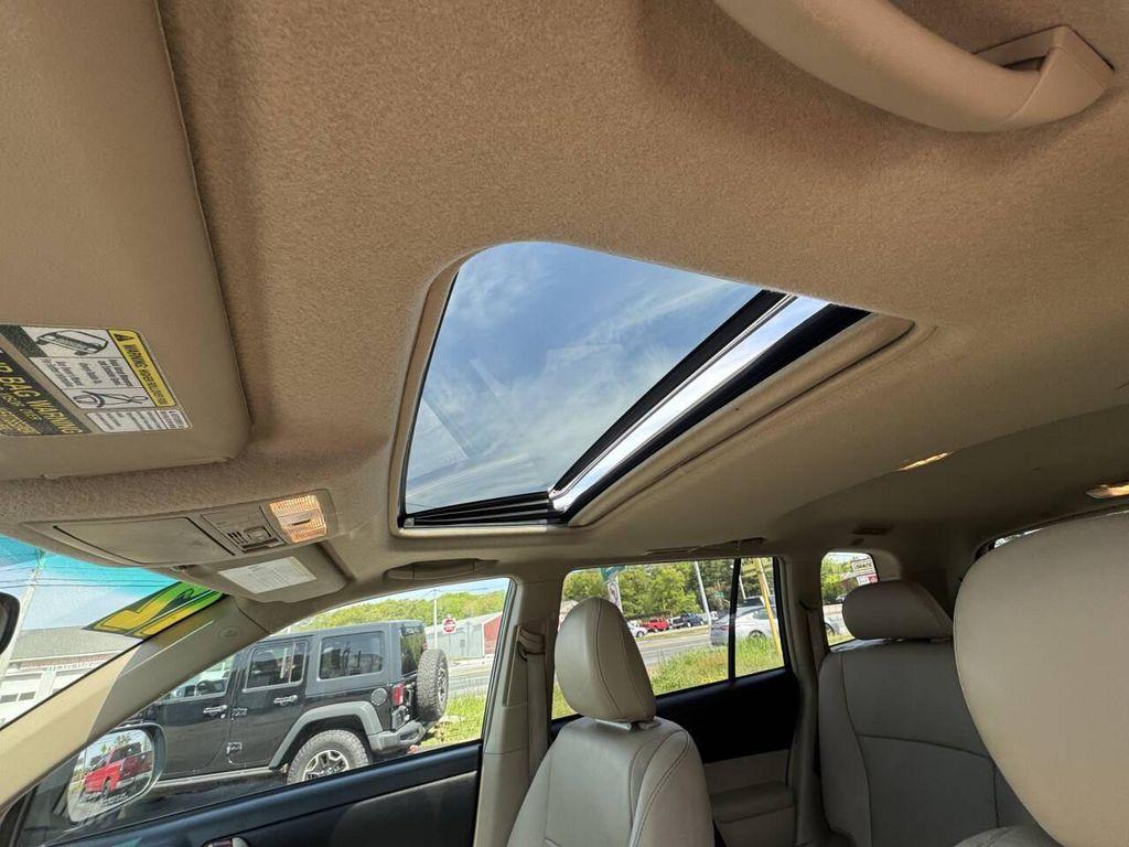 used 2012 Toyota Highlander car, priced at $13,900