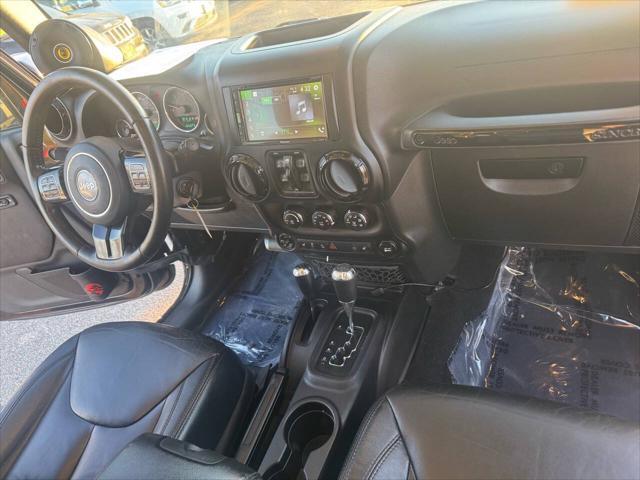 used 2014 Jeep Wrangler Unlimited car, priced at $18,900