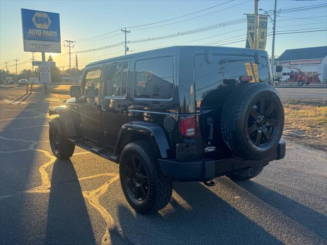 used 2014 Jeep Wrangler Unlimited car, priced at $18,900