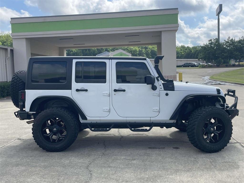 used 2015 Jeep Wrangler Unlimited car, priced at $18,195