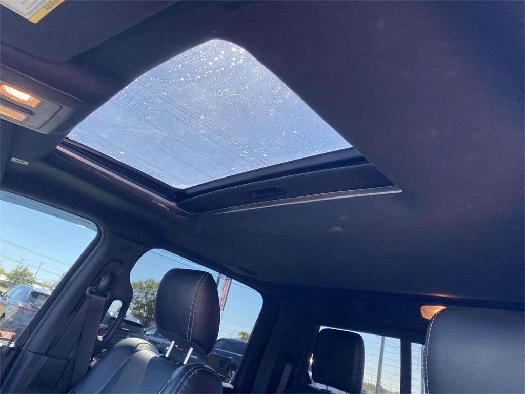 used 2018 Ram 1500 car, priced at $25,021