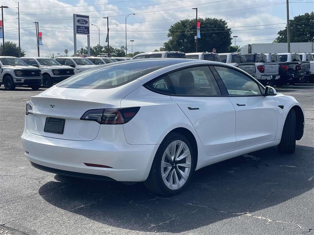 used 2023 Tesla Model 3 car, priced at $25,100