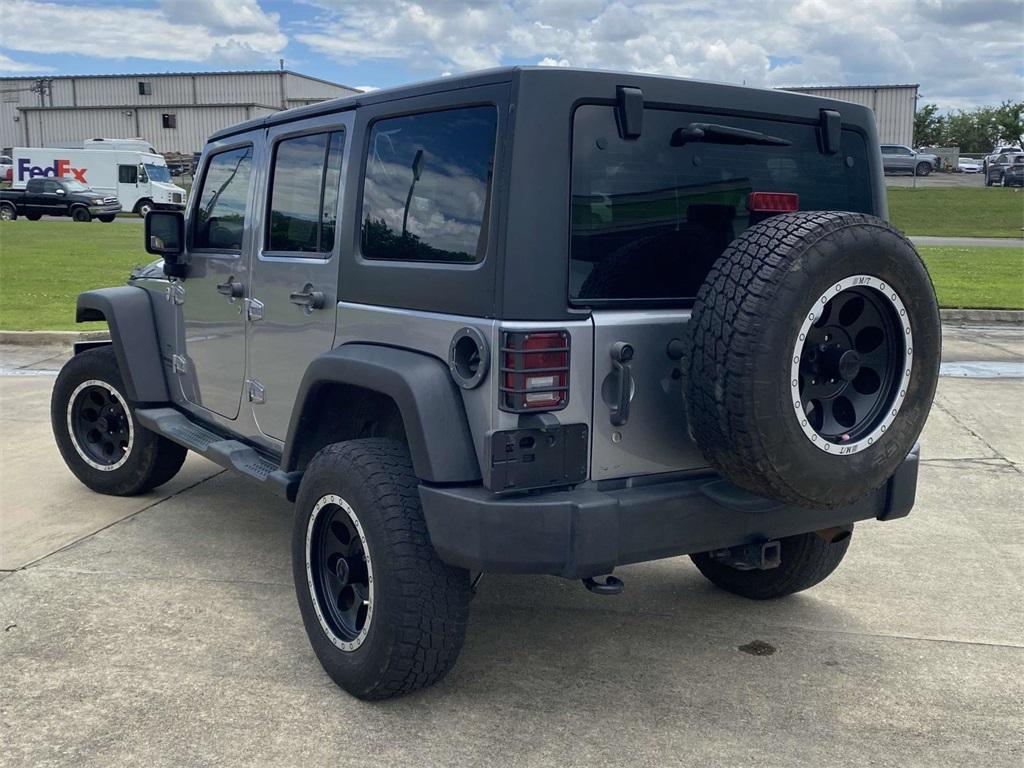 used 2013 Jeep Wrangler Unlimited car, priced at $16,065