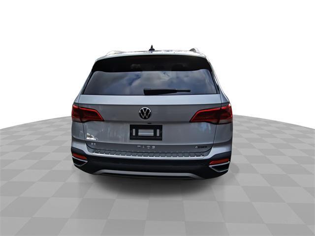 used 2022 Volkswagen Taos car, priced at $22,100