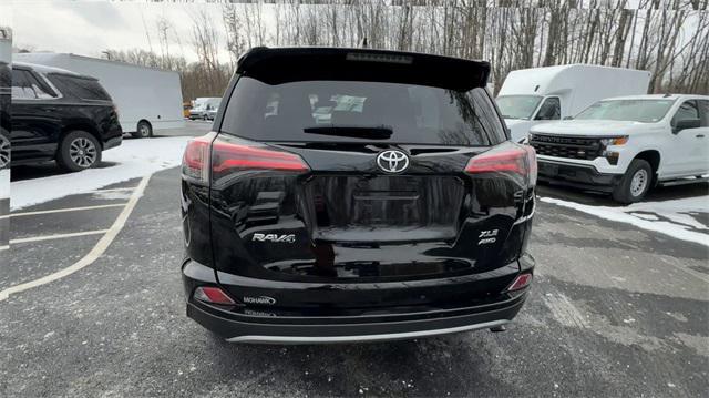 used 2018 Toyota RAV4 car, priced at $18,233