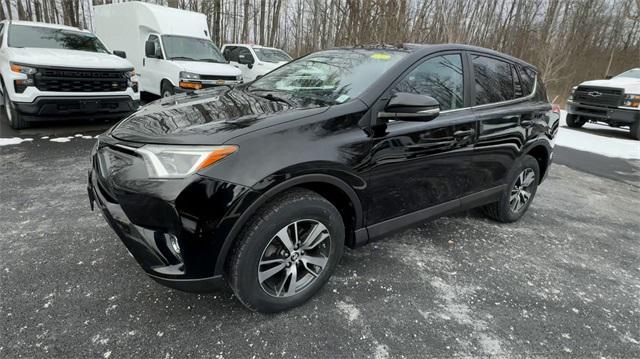 used 2018 Toyota RAV4 car, priced at $18,233