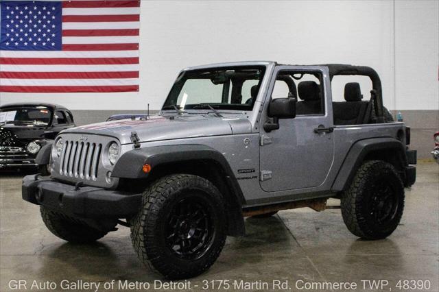 used 2014 Jeep Wrangler car, priced at $15,900