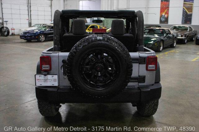 used 2014 Jeep Wrangler car, priced at $15,900