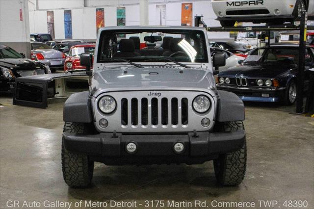 used 2014 Jeep Wrangler car, priced at $15,900