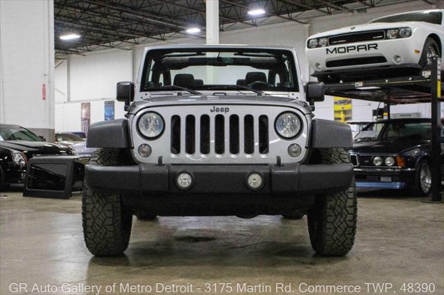 used 2014 Jeep Wrangler car, priced at $15,900