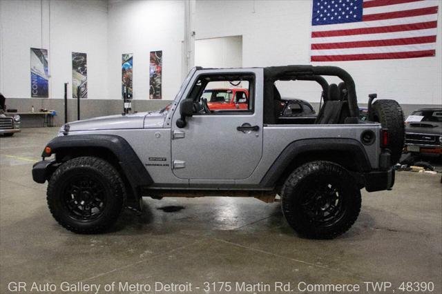 used 2014 Jeep Wrangler car, priced at $15,900