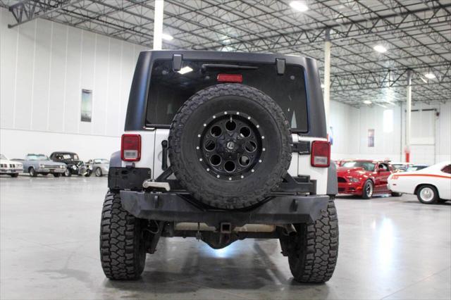 used 2013 Jeep Wrangler Unlimited car, priced at $21,900