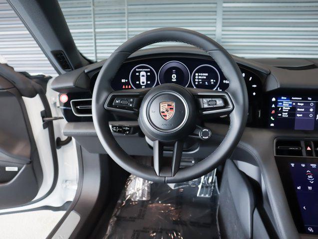 new 2026 Porsche Taycan car, priced at $129,800