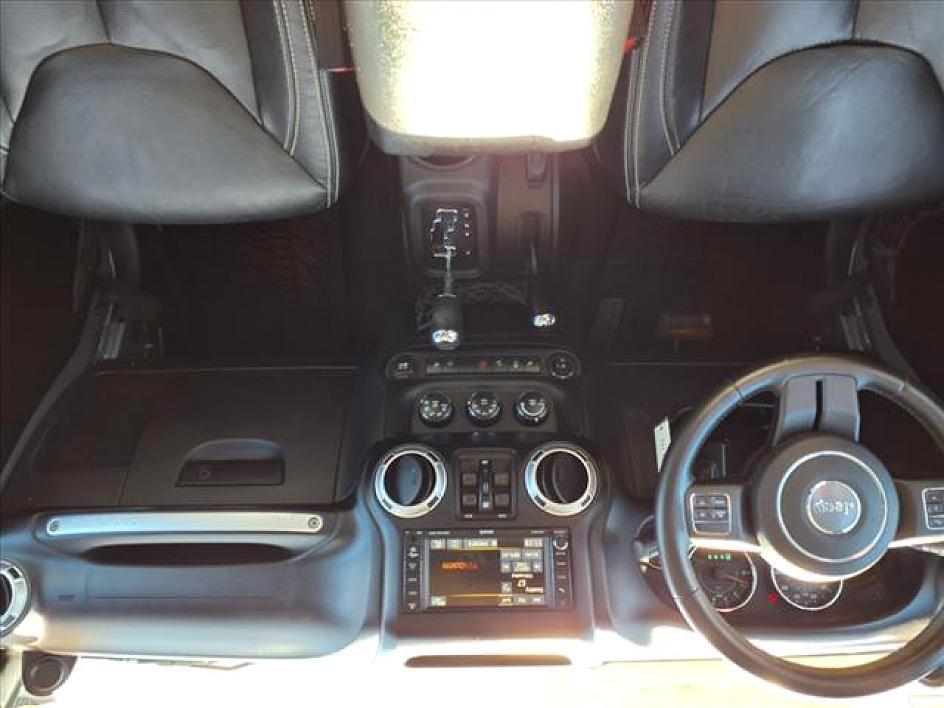 used 2013 Jeep Wrangler Unlimited car, priced at $18,170