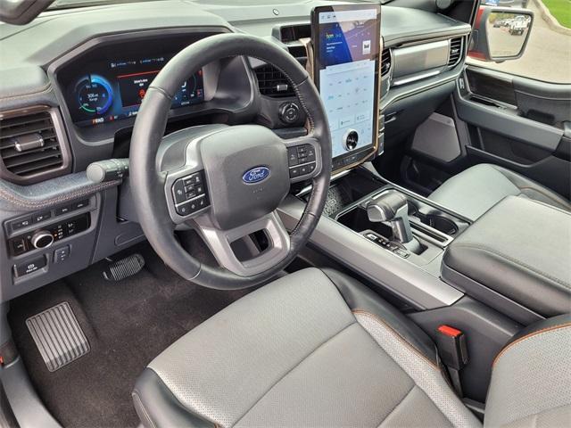 used 2024 Ford F-150 Lightning car, priced at $62,057