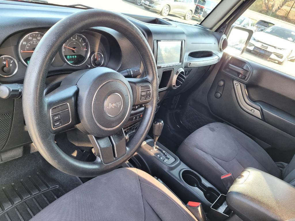 used 2015 Jeep Wrangler car, priced at $17,537