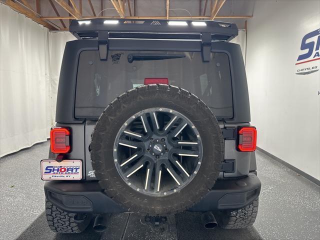 used 2018 Jeep Wrangler JK Unlimited car, priced at $29,900