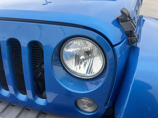 used 2015 Jeep Wrangler Unlimited car, priced at $18,490