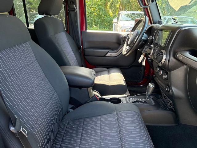 used 2011 Jeep Wrangler Unlimited car, priced at $12,000