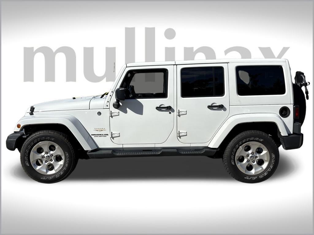 used 2013 Jeep Wrangler Unlimited car, priced at $14,500