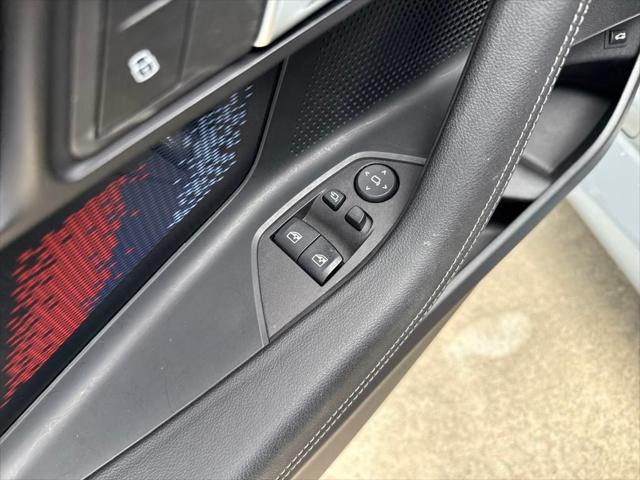 used 2024 BMW M2 car, priced at $64,801
