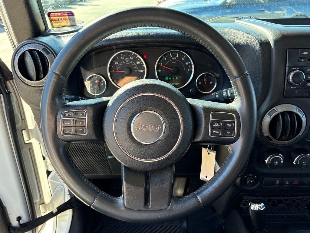 used 2015 Jeep Wrangler Unlimited car, priced at $13,400