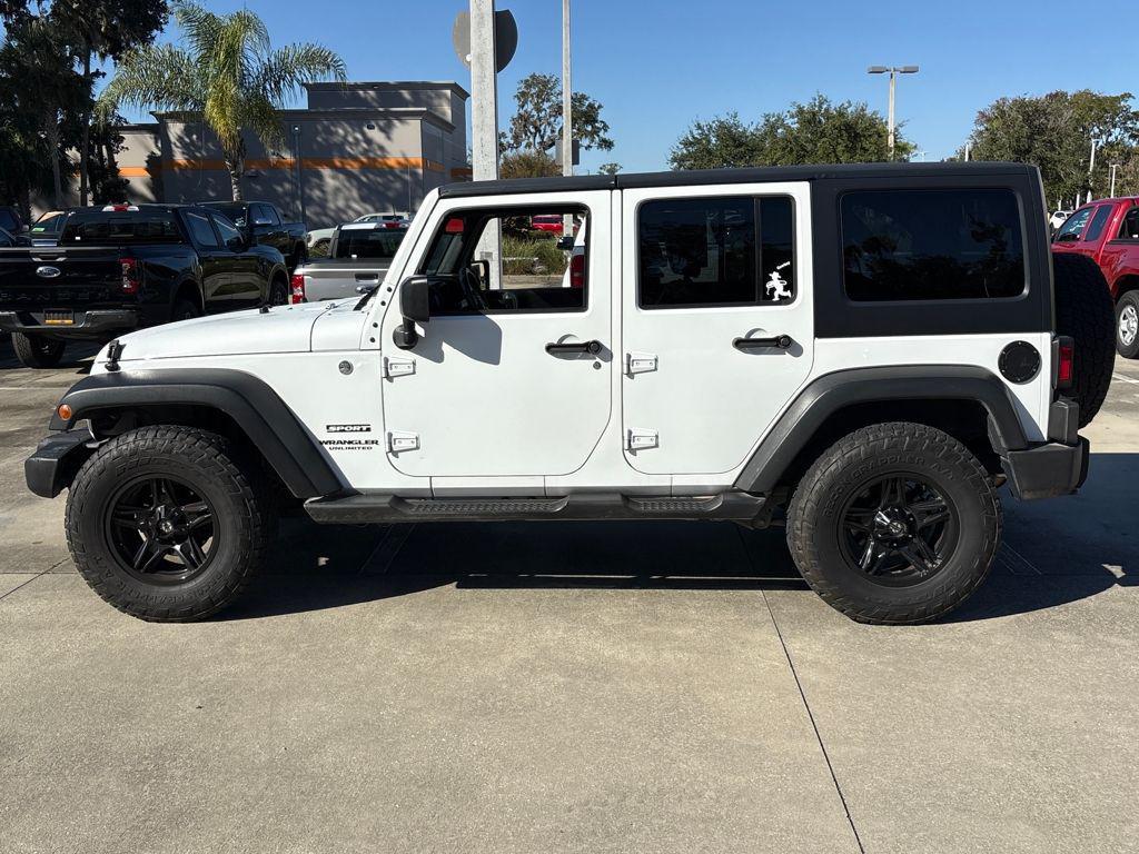 used 2015 Jeep Wrangler Unlimited car, priced at $13,400