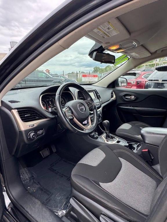 used 2014 Jeep Cherokee car, priced at $7,599