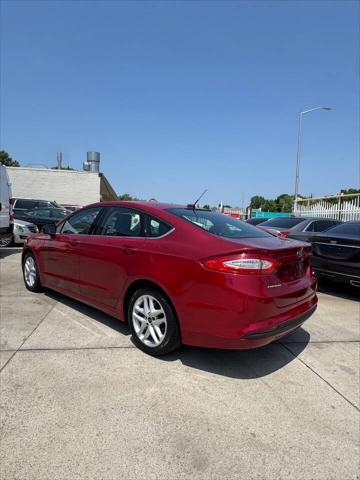 used 2014 Ford Fusion car, priced at $5,299