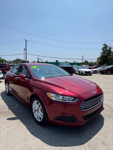 used 2014 Ford Fusion car, priced at $5,299