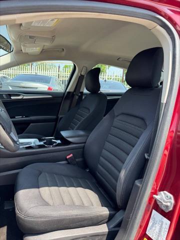 used 2014 Ford Fusion car, priced at $5,299