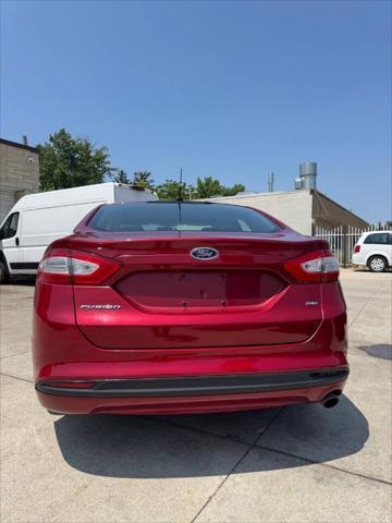 used 2014 Ford Fusion car, priced at $5,299