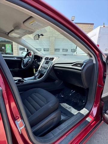 used 2014 Ford Fusion car, priced at $5,299