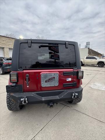 used 2013 Jeep Wrangler Unlimited car, priced at $13,599