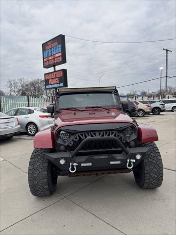 used 2013 Jeep Wrangler Unlimited car, priced at $13,599