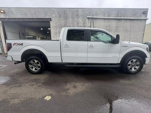 used 2014 Ford F-150 car, priced at $15,999