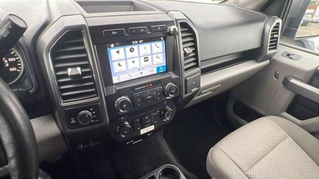used 2018 Ford F-150 car, priced at $19,299