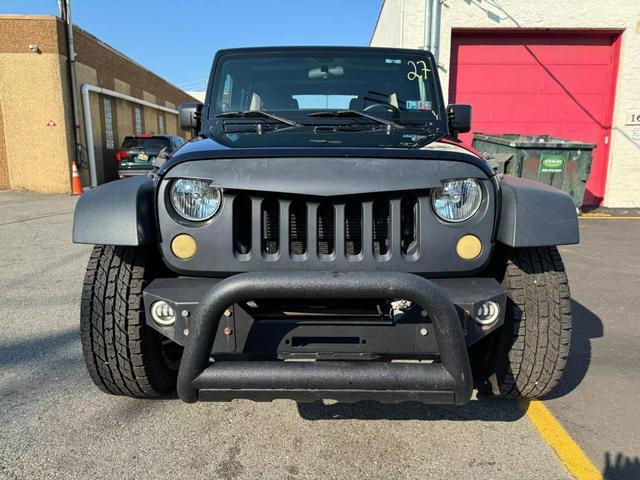 used 2013 Jeep Wrangler Unlimited car, priced at $16,799