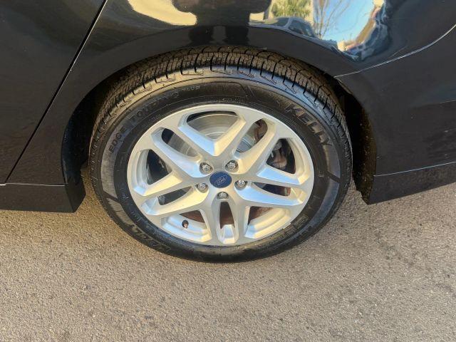 used 2014 Ford Fusion car, priced at $7,999