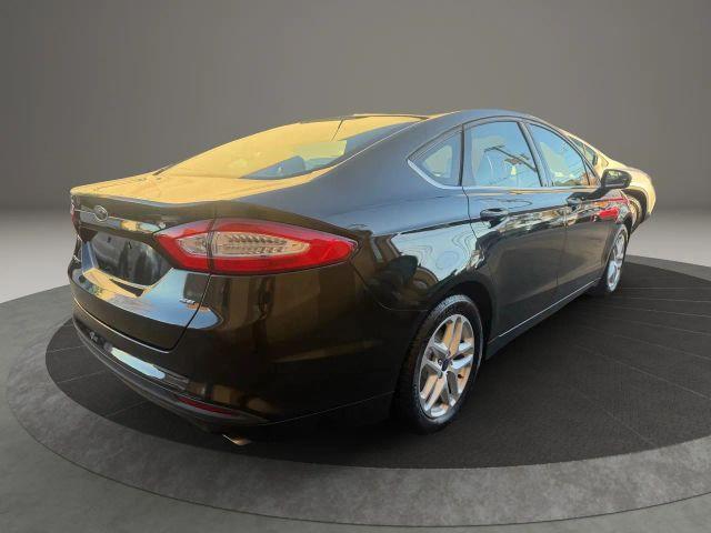 used 2014 Ford Fusion car, priced at $7,999