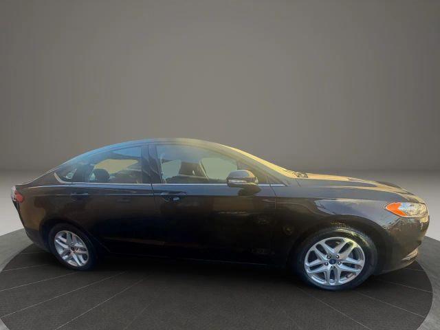 used 2014 Ford Fusion car, priced at $7,999