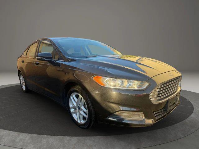 used 2014 Ford Fusion car, priced at $7,999